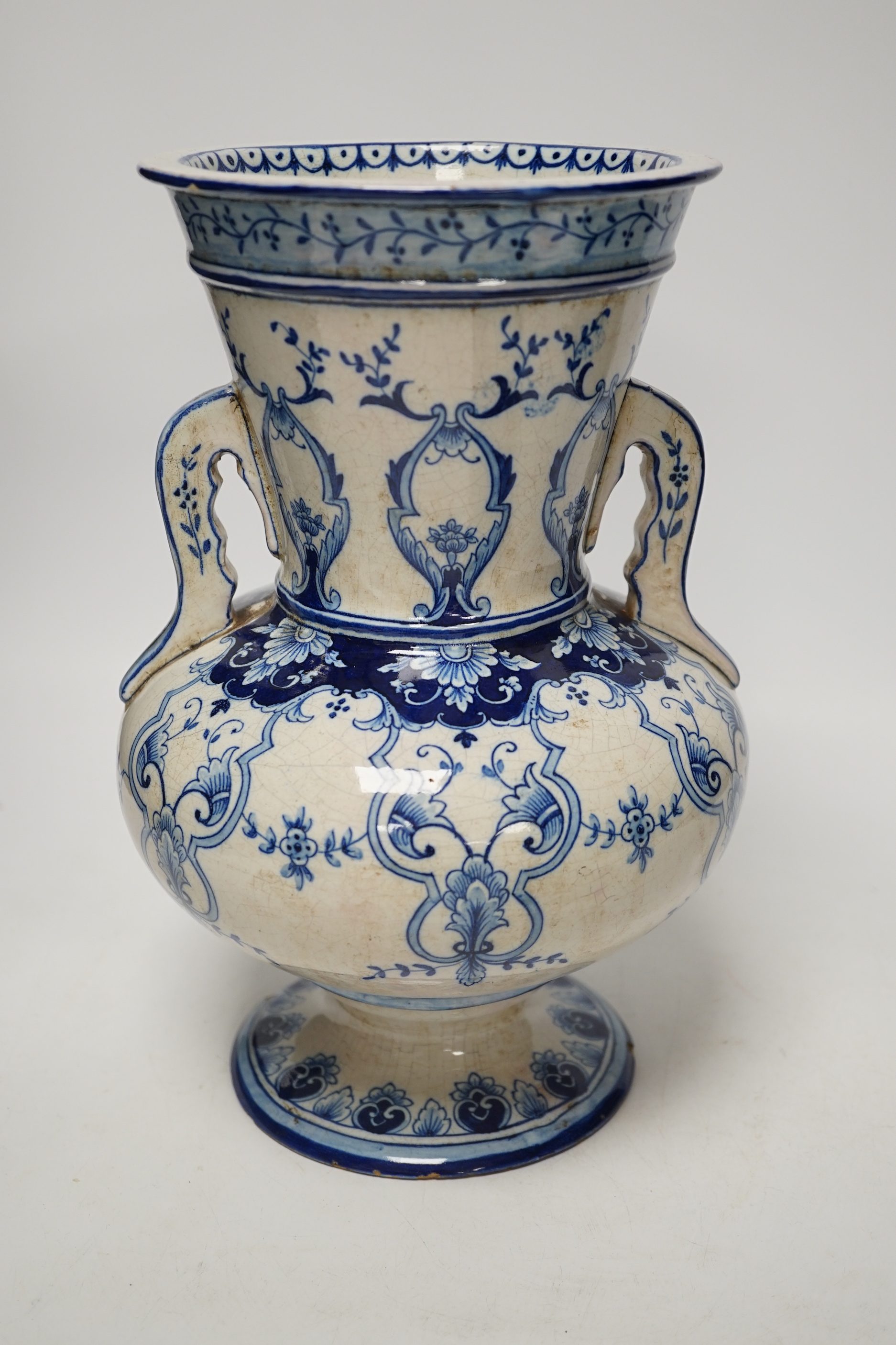 A Chinese blue and white jar and cover, Xuande mark, probably late Qing and a French faience vase (2) tallest 29.5cm